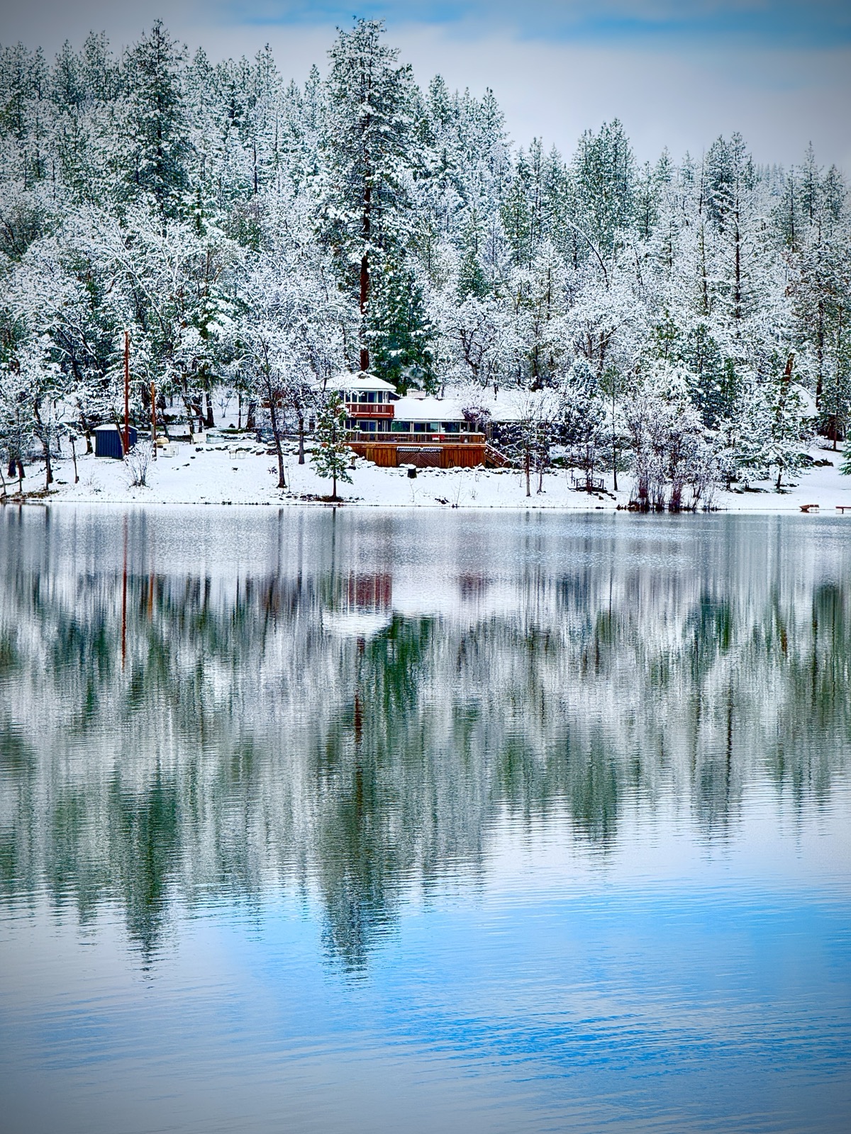 Indian Lake Ranch main view overlooking the water with mountain views